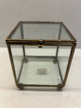 Vintage Glass Display Jewelry Box with Brass Frame and small ball feet .